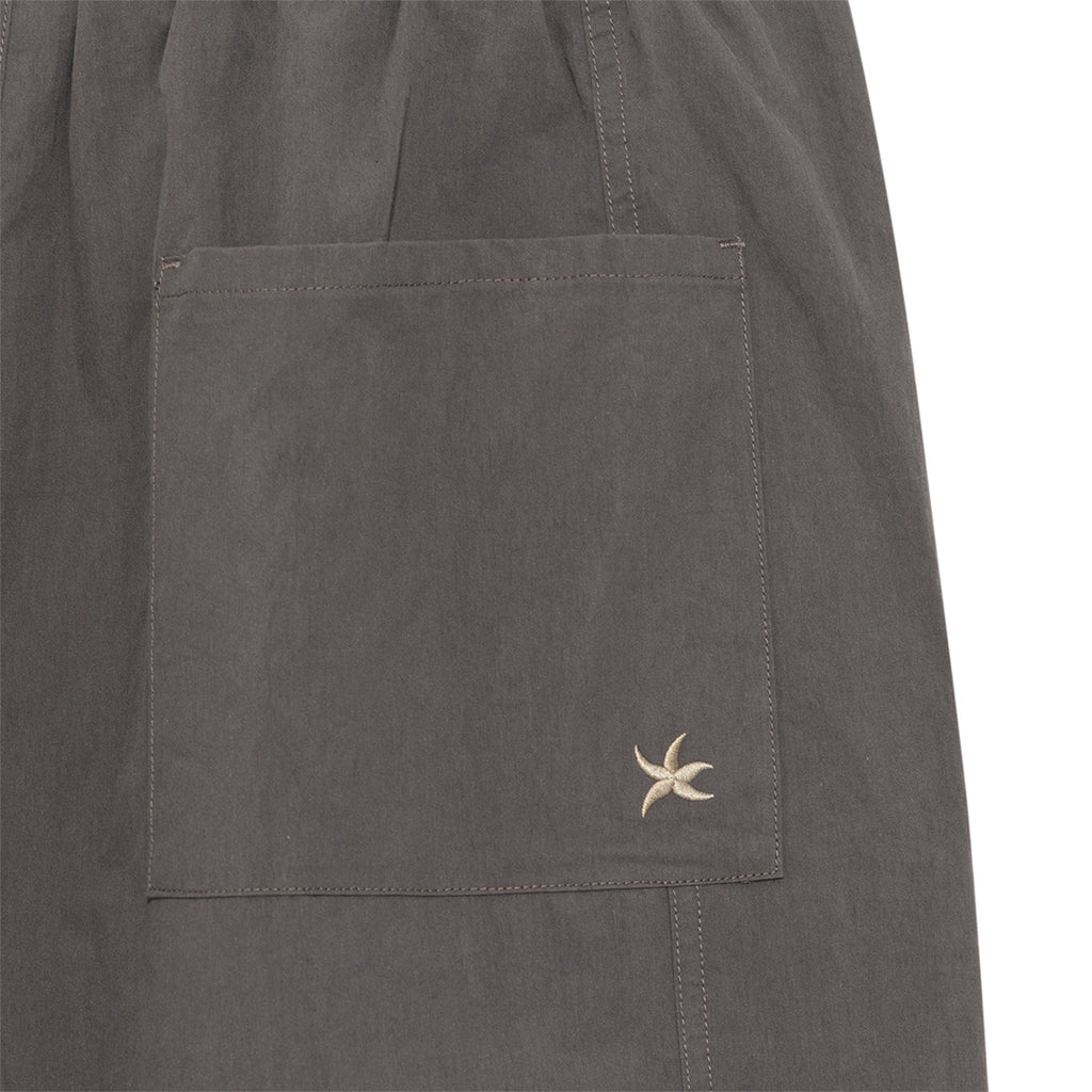 TCM mini logo nylon pants