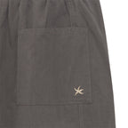TCM mini logo nylon pants