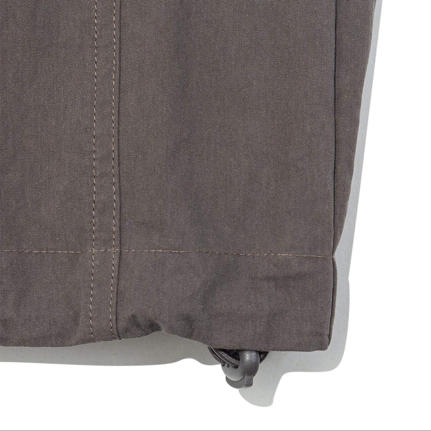 TCM mini logo nylon pants